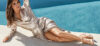 Eva Longoria w butach eobuwie nad basenem
